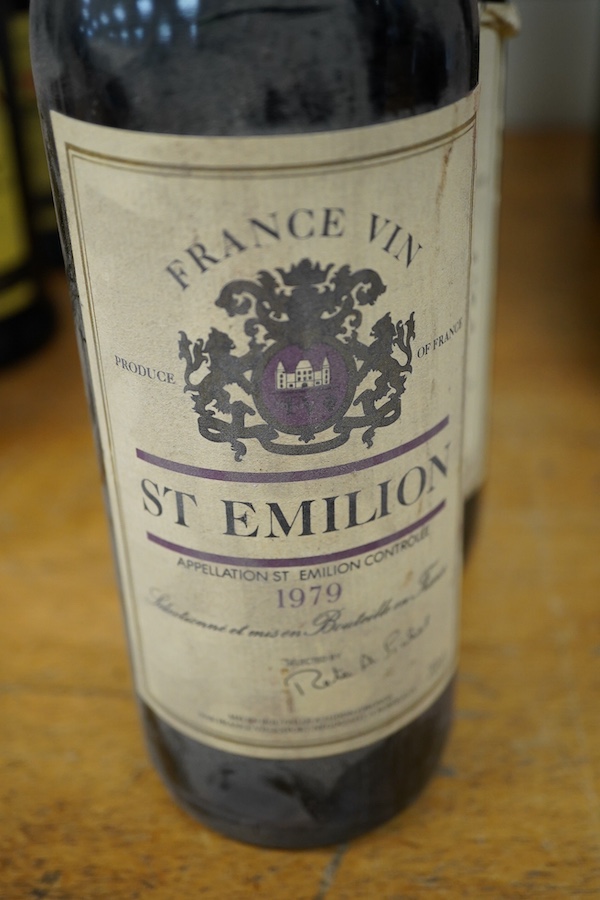 Six bottles of wine including three bottles of Moulin Touchais Anjou 1959, Prince Consort Costieres di Gard, two bottles of St. Emilion 1979, etc.